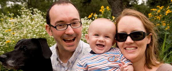 Kilibarda family sitting on steps together smiling